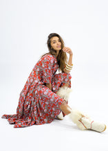 Load image into Gallery viewer, The Skye Maxi shirt dress is a gorgeous full length maxi dress, featuring a wide tiered section at the hem and side slits either side.  With a stylish shirt collar, buttoned to the chest with a seam under the bust and 3/4 cuffed sleeves. The skirt has generous volume with so much fabric, which is soft and floaty in a gorgeous red floral print.  Can be worn belted or loose with pockets

